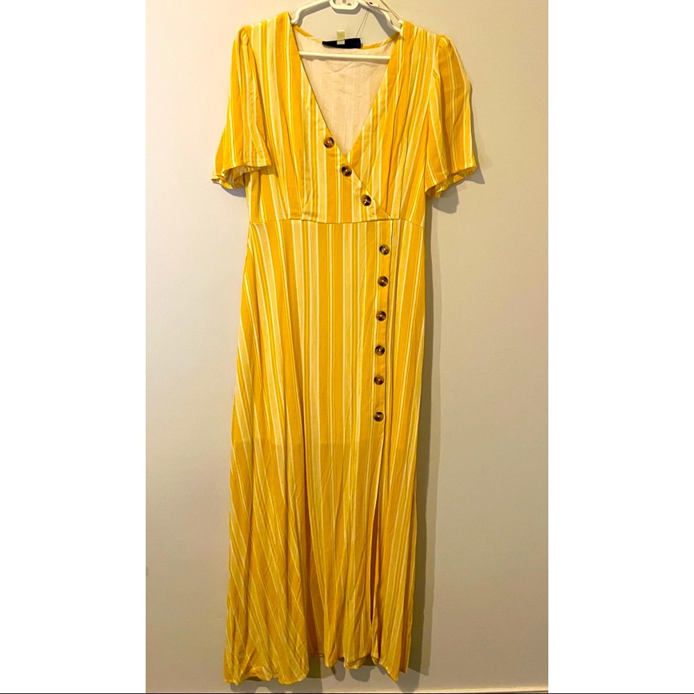 Yellow full-length dress with high slit